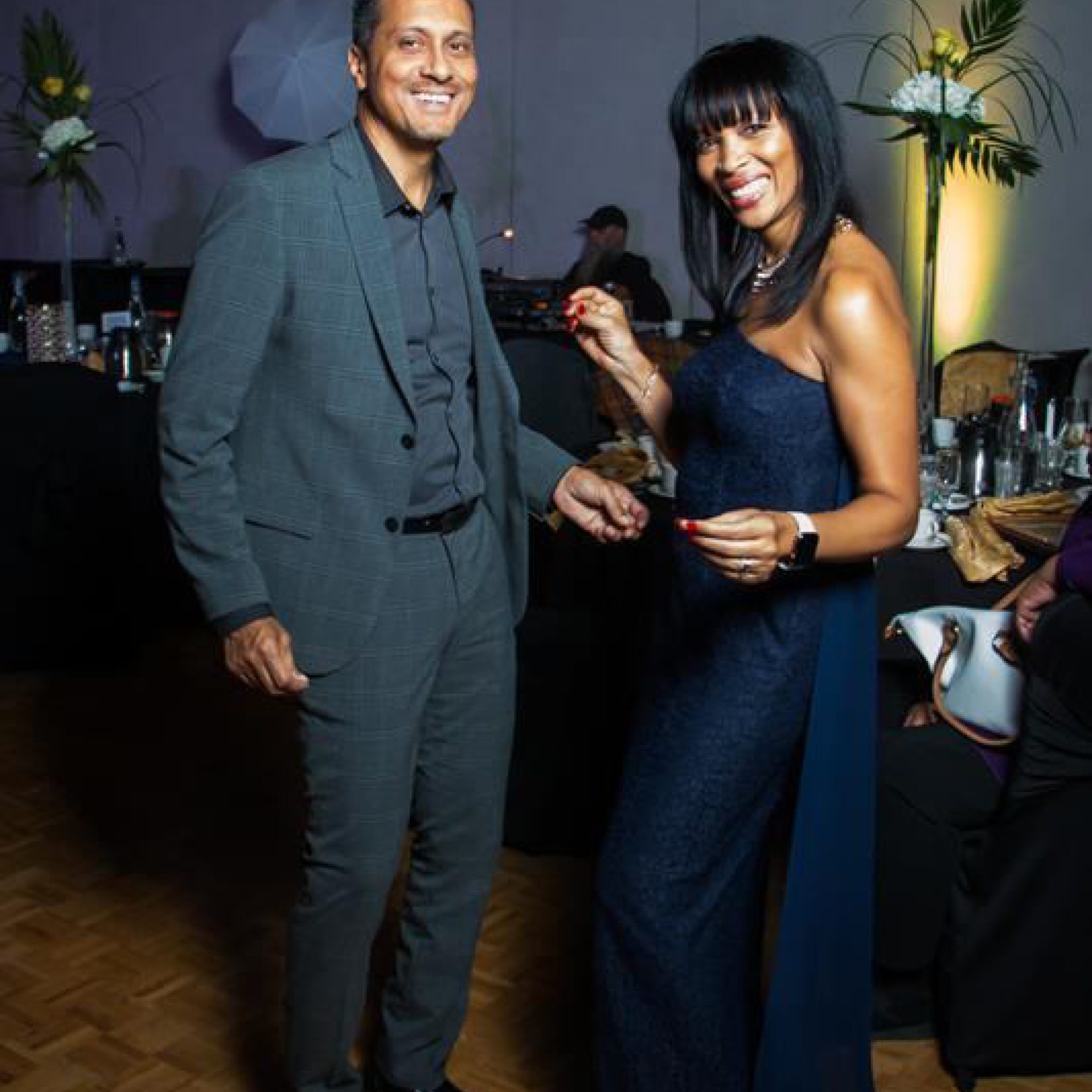 Two happy people dancing.