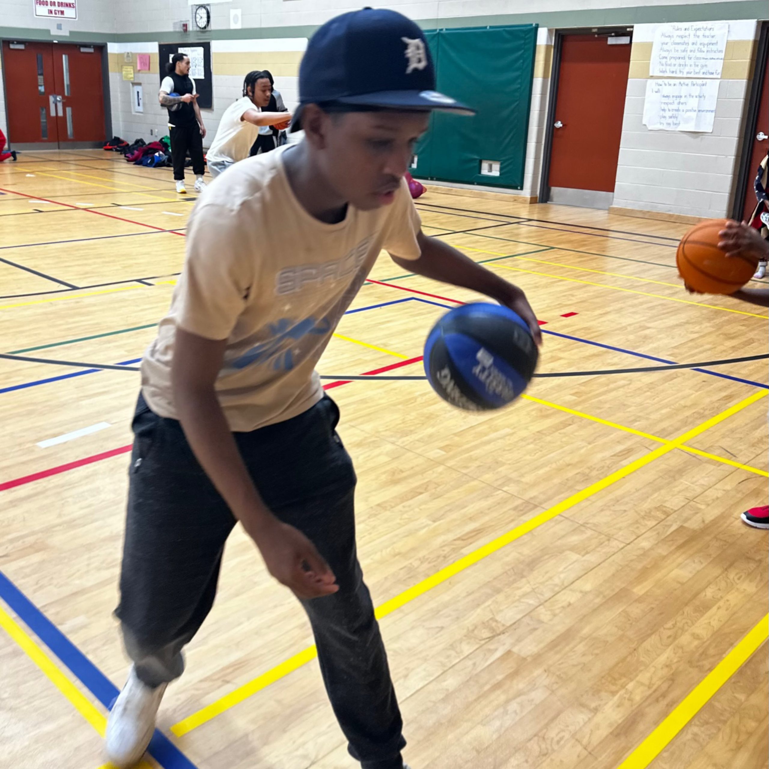 Young person playing basketball.